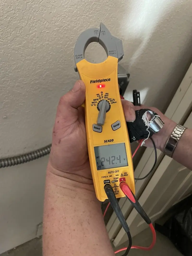 Voltage testing with clamp meter during Electrical Installation Services in Redondo Beach